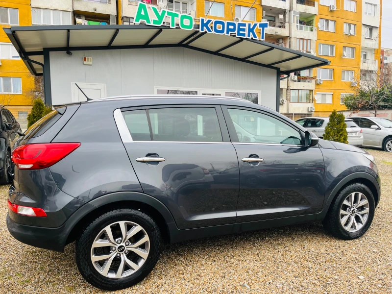 Kia Sportage 1.6i BI FUEL Перфектен, снимка 8 - Автомобили и джипове - 53041873