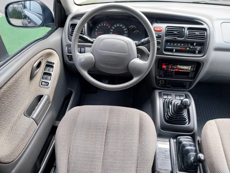 Suzuki Grand vitara * 4x4* 2 5i /144кс/Клима/Като нова!!!, снимка 11 - Автомобили и джипове - 53385832