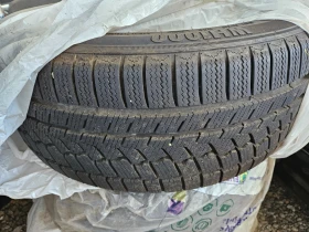 Гуми Зимни 245/45R18, снимка 2 - Гуми и джанти - 46779650