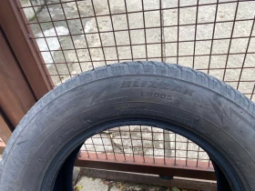 Гуми Зимни 215/65R16, снимка 5 - Гуми и джанти - 52795796