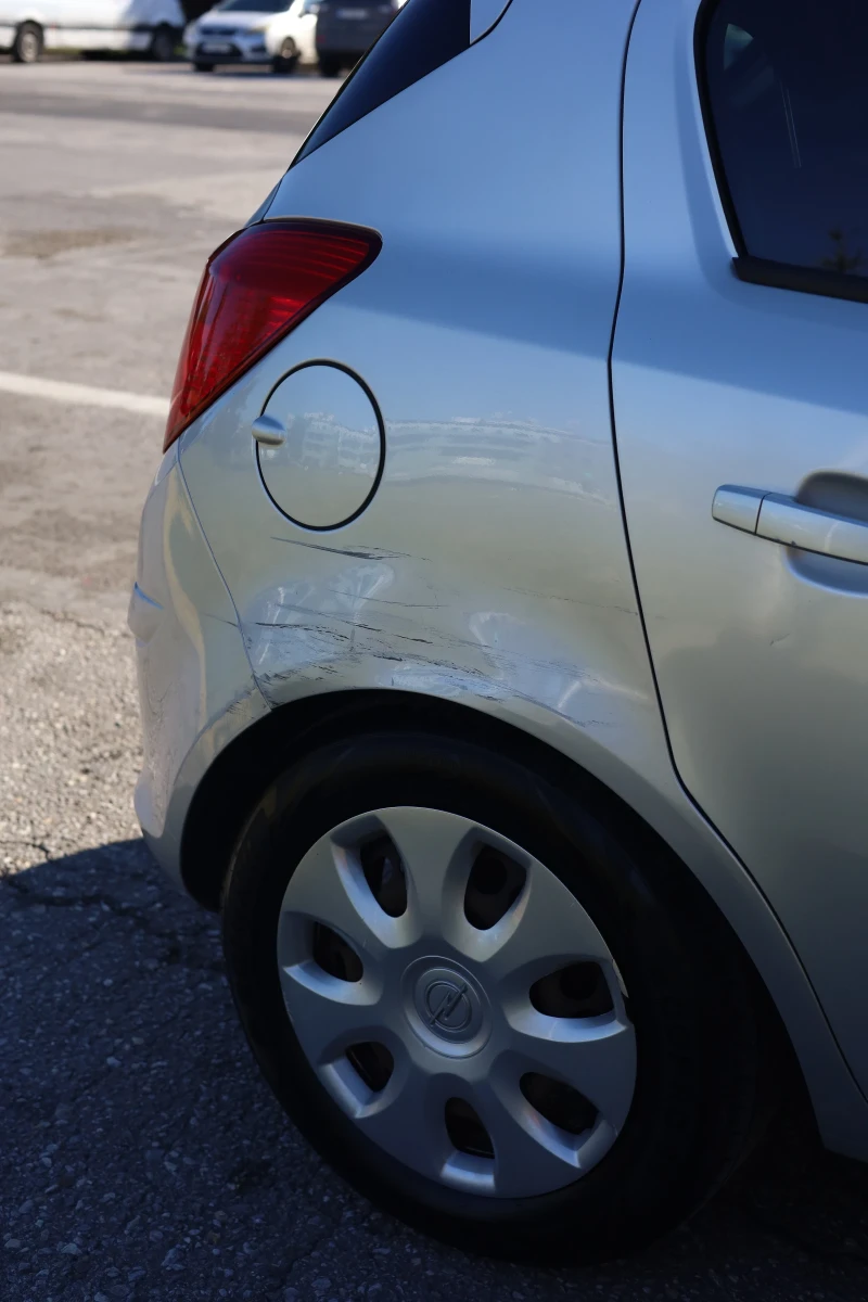 Opel Corsa 1.2i 16V ECOTEC, снимка 16 - Автомобили и джипове - 52265695