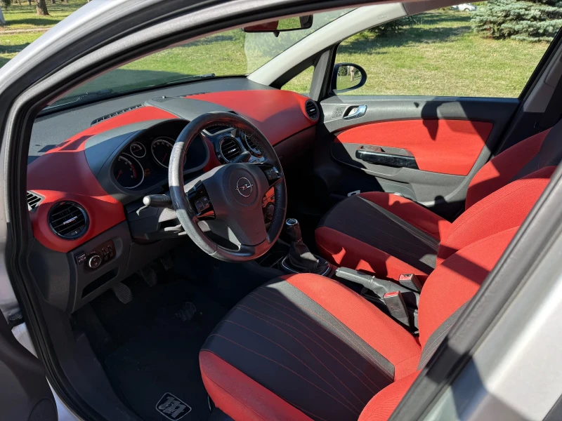 Opel Corsa 1.2i 16V ECOTEC, снимка 12 - Автомобили и джипове - 52265695