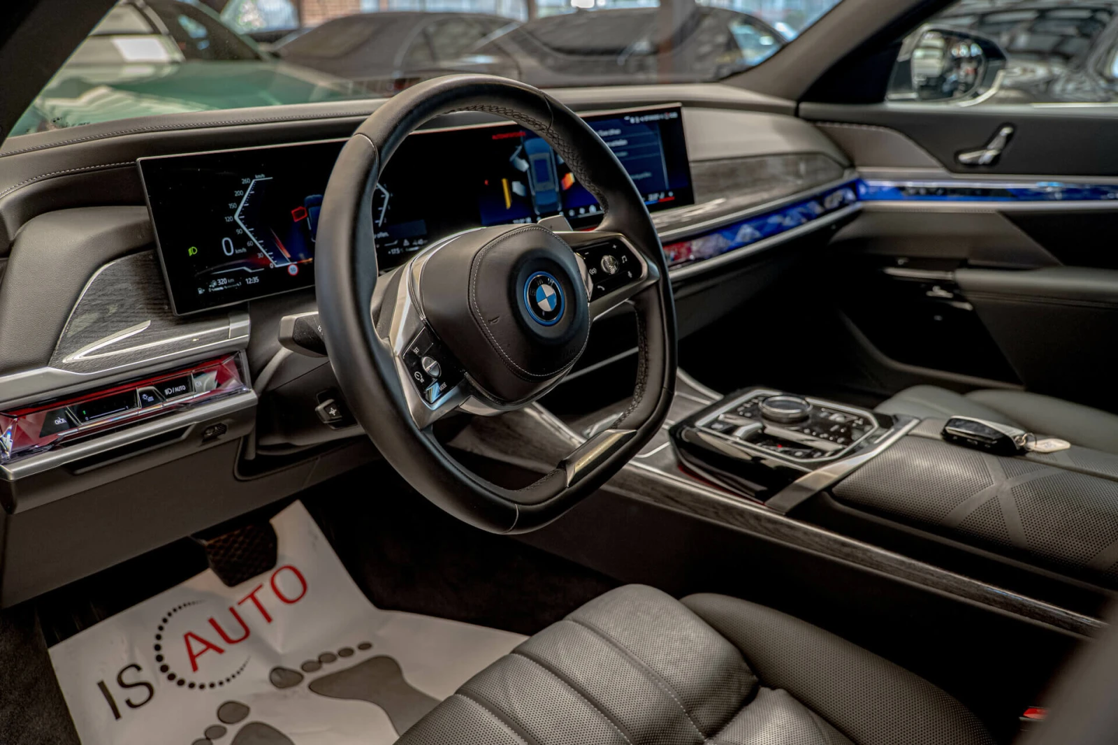 BMW 750 E/xDrive/SKY Lounge/INDIVIDUAL/Bowers & Wilkins/Au, снимка 8 - Автомобили и джипове - 53837371