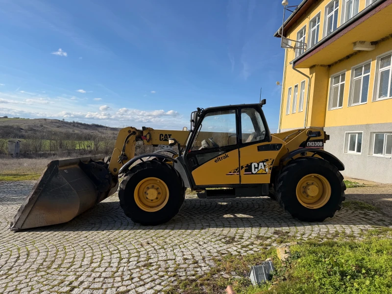 Телескопичен товарач Caterpillar TH 330 B С КОФА И ВИЛИЦИ ЛИЗИНГ, снимка 4 - Селскостопанска техника - 53258611