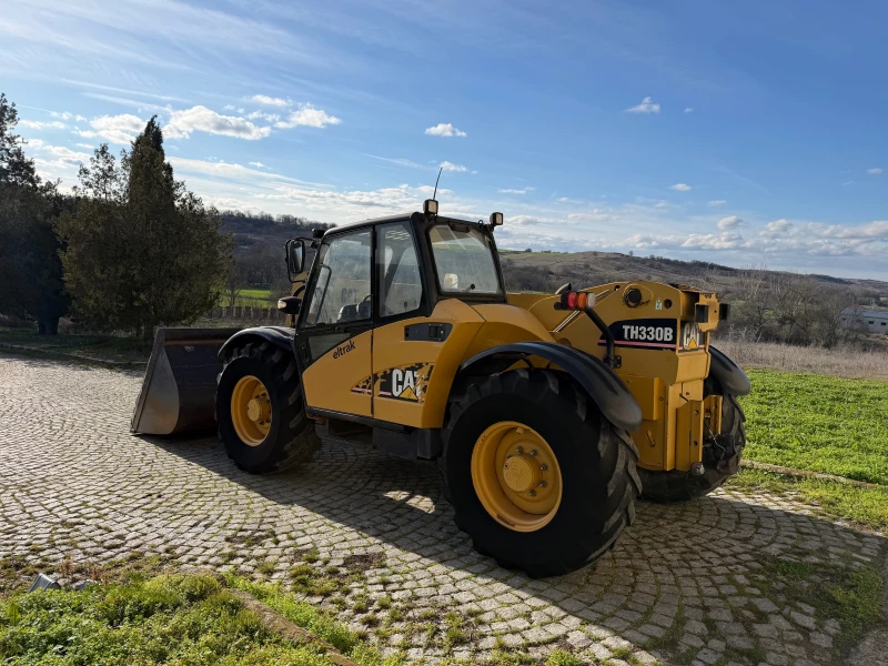 Телескопичен товарач Caterpillar TH 330 B С КОФА И ВИЛИЦИ ЛИЗИНГ, снимка 5 - Селскостопанска техника - 53258611