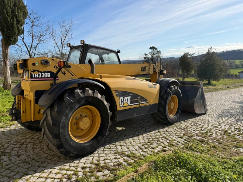 Телескопичен товарач Caterpillar TH 330 B С КОФА И ВИЛИЦИ ЛИЗИНГ, снимка 7 - Селскостопанска техника - 53258611