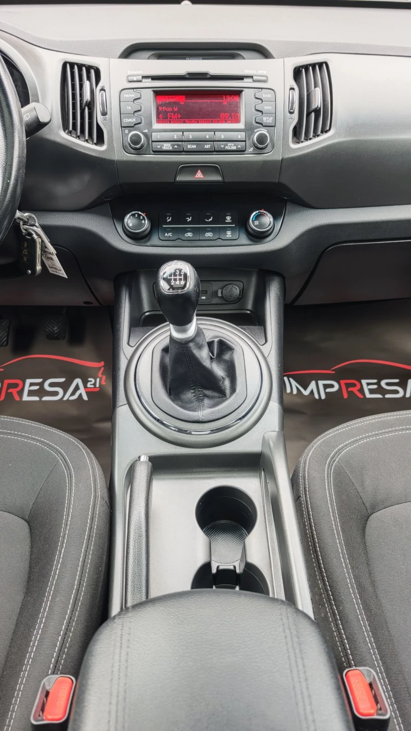 Kia Sportage 1.7d, снимка 11 - Автомобили и джипове - 52692154