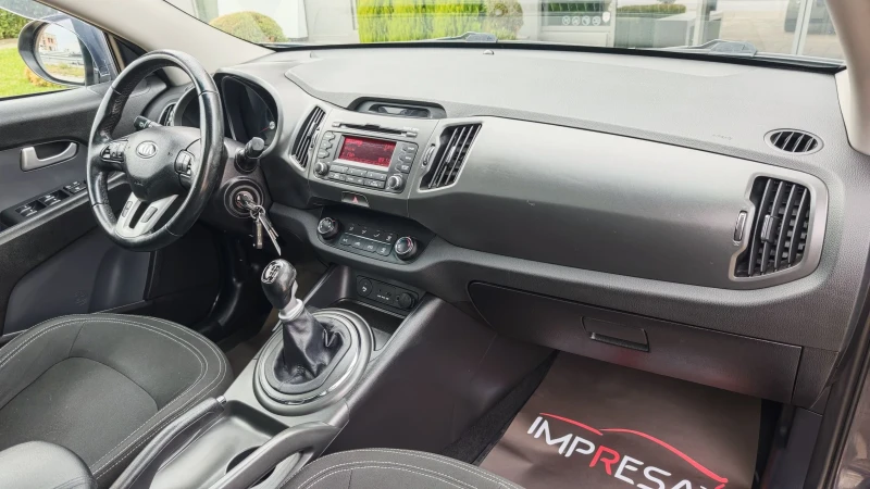 Kia Sportage 1.7d, снимка 9 - Автомобили и джипове - 52692154