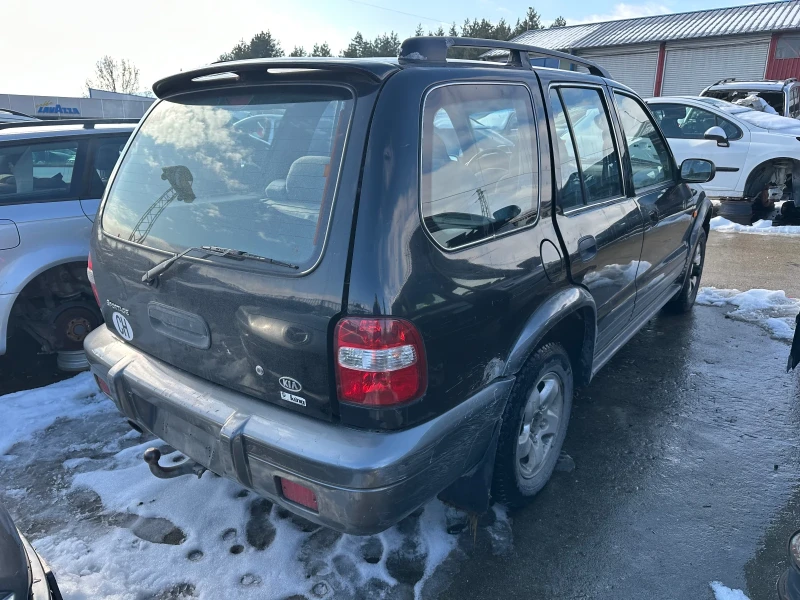 Kia Sportage 2.0 i автомат, снимка 3 - Автомобили и джипове - 48788570