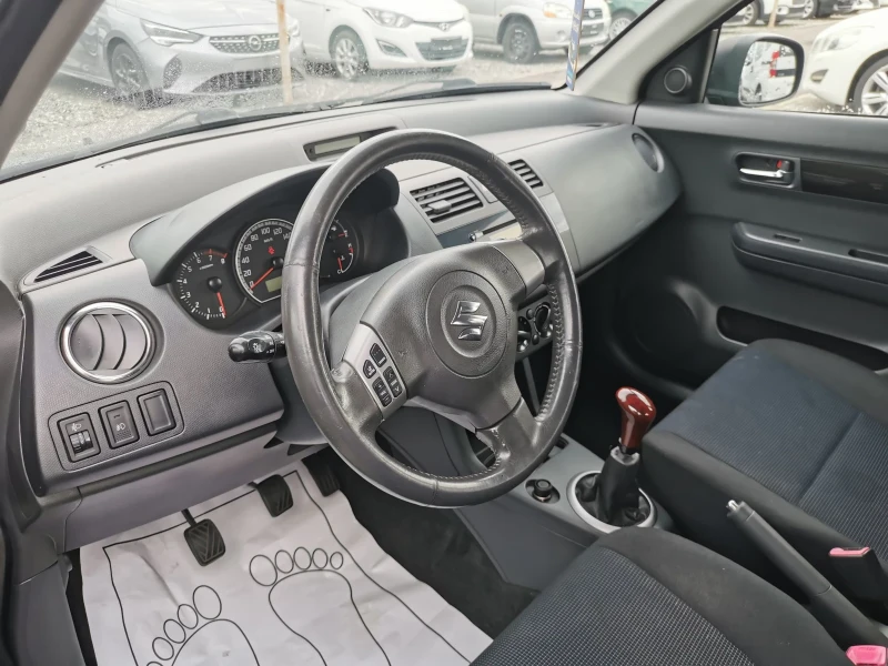 Suzuki Swift 1.3i, снимка 9 - Автомобили и джипове - 47582453