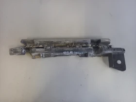 Водач държач калник десен Рено Лагуна (б)