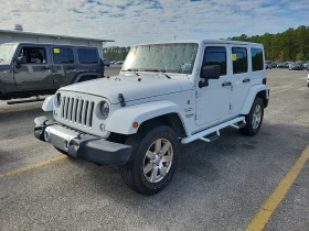 Обява за продажба на Jeep Wrangler Unlimited Sahara ~29 700 лв. - изображение 1