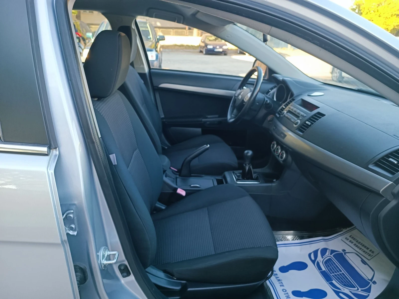 Mitsubishi Lancer 1.8i-143кс-ШВЕЙЦАРИЯ-РЪЧКА, снимка 11 - Автомобили и джипове - 56016113