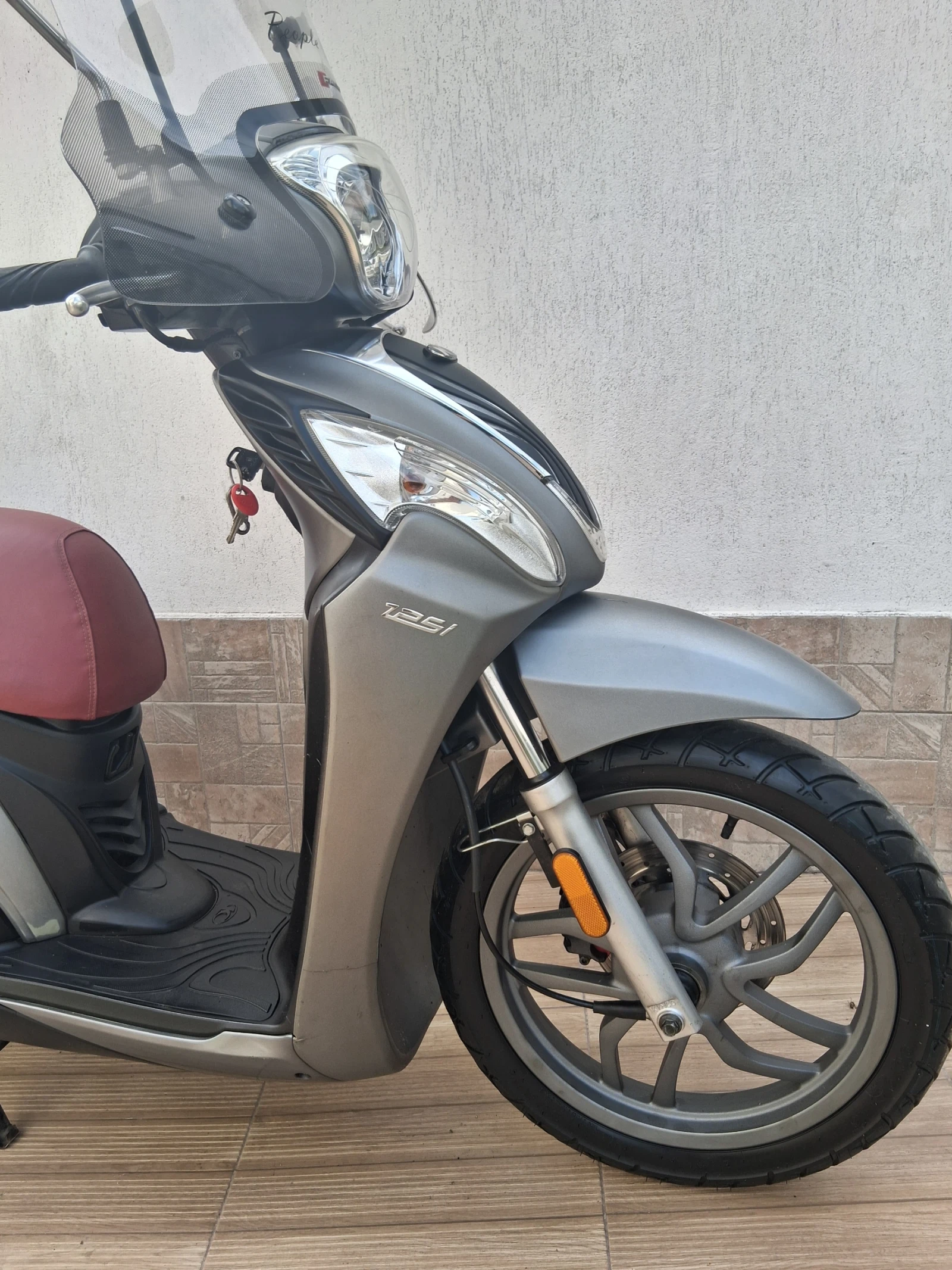 Kymco People  - изображение 6