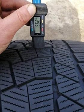 Гуми Зимни 305/35R21, снимка 7