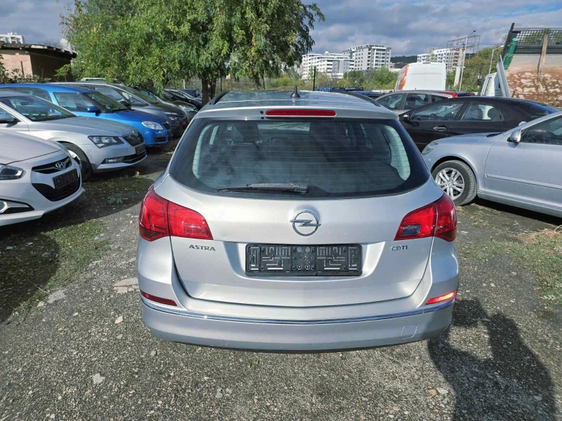 Opel Astra ПРОМО ЦЕНА/1.6cdti/FACE/ПЕРФЕКТЕН, снимка 5 - Автомобили и джипове - 53086085