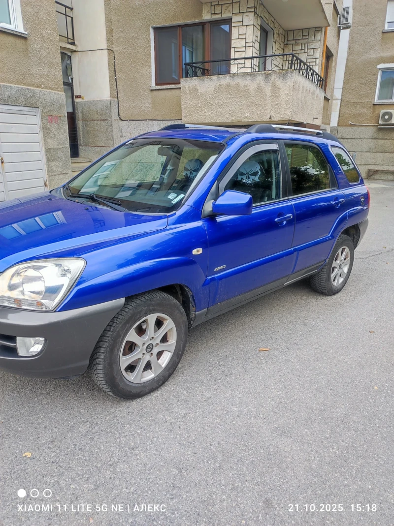 Kia Sportage 2.0 , снимка 12 - Автомобили и джипове - 52583326