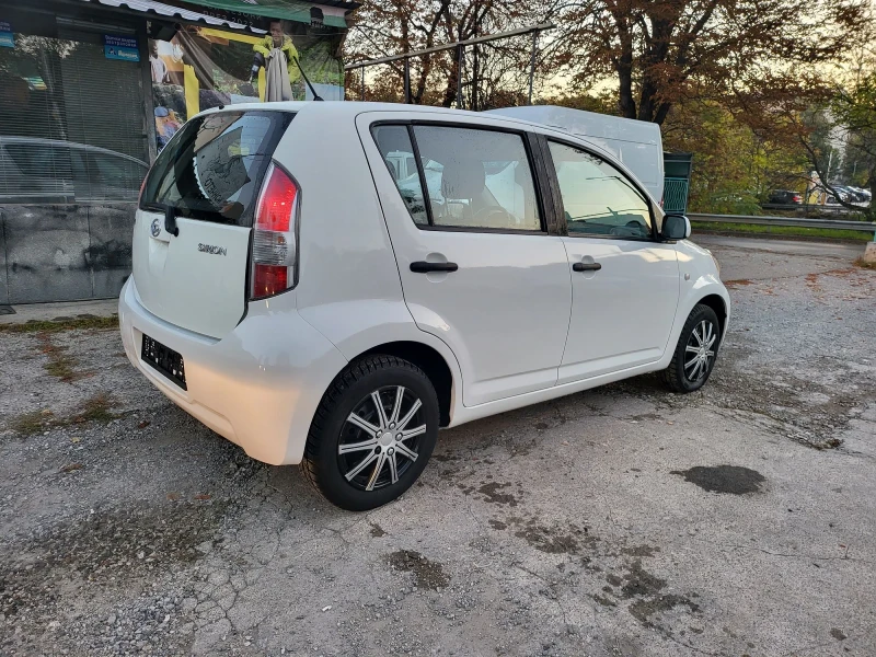 Daihatsu Sirion 1.3I 16v AWD 4x4, снимка 4 - Автомобили и джипове - 47699637