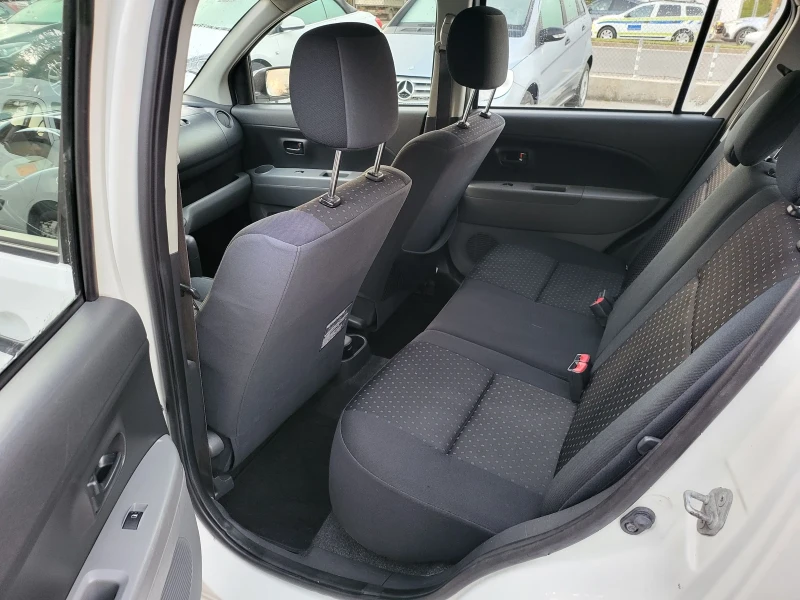 Daihatsu Sirion 1.3I 16v AWD 4x4, снимка 8 - Автомобили и джипове - 47699637