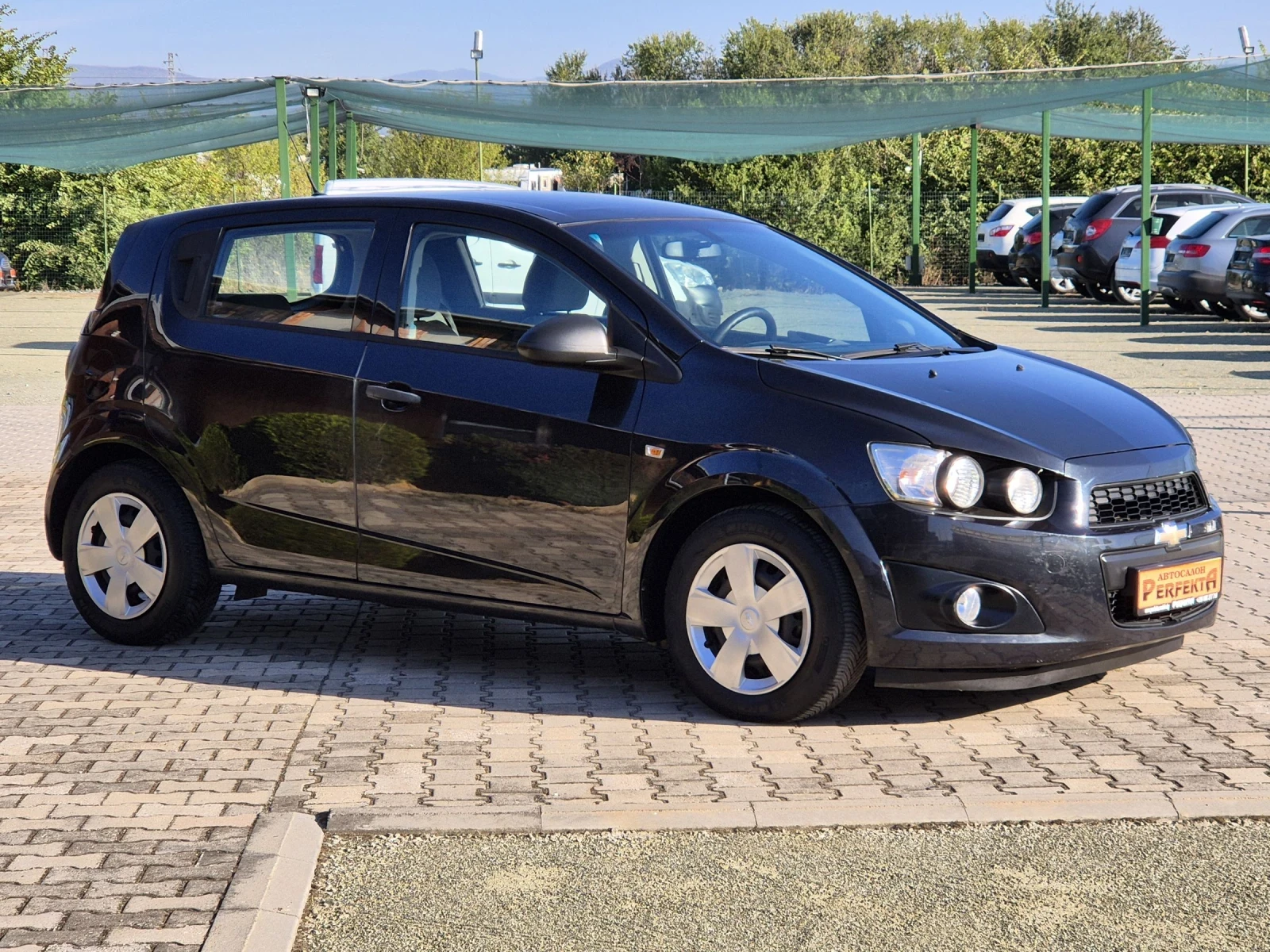 Chevrolet Aveo 1.2 газ/бензин - изображение 6