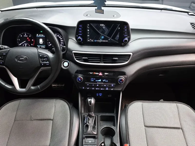 Hyundai Tucson Diesel 1.6 2Wd Premium, снимка 7 - Автомобили и джипове - 56130873