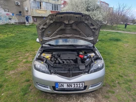 Mazda 2 1.25i, снимка 11