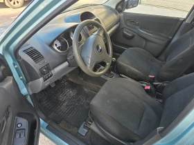 Subaru G3x justy 1.3 4х4, снимка 11