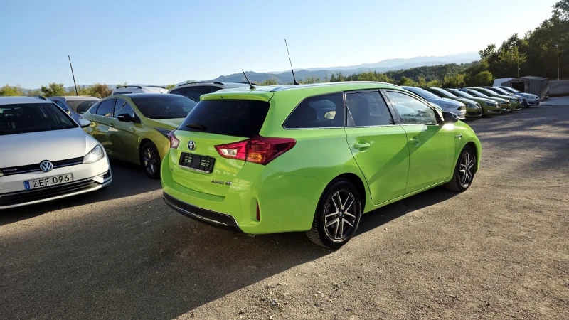 Toyota Auris Hybrid* ГОТОВА ЗА ТАКСИ, снимка 10 - Автомобили и джипове - 51646330