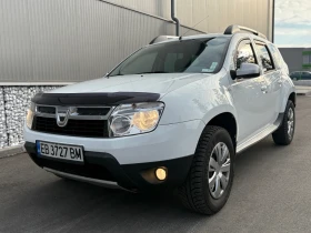 Dacia Duster 1.6i ГАЗ ИНЖЕКЦИОН-ПЕРФЕКТНА!!, снимка 1