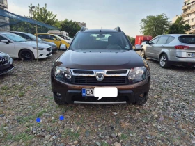 Dacia Duster 1.6 газ 4х4, снимка 1