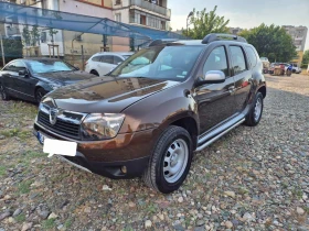 Dacia Duster 1.6 газ 4х4, снимка 9