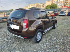 Dacia Duster 1.6 газ 4х4, снимка 3