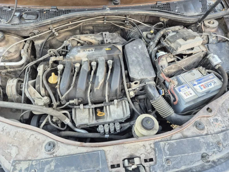 Dacia Duster 1.6 газ 4х4, снимка 13 - Автомобили и джипове - 52590280