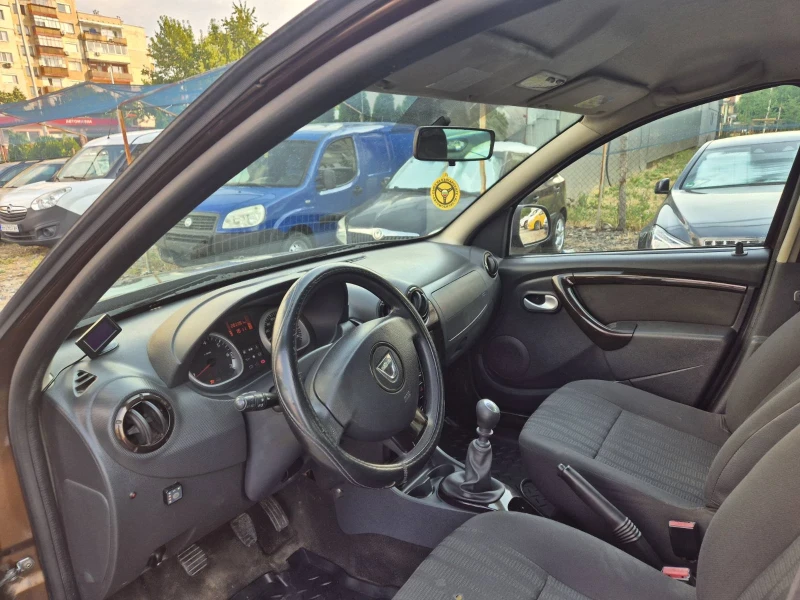 Dacia Duster 1.6 газ 4х4, снимка 6 - Автомобили и джипове - 52590280