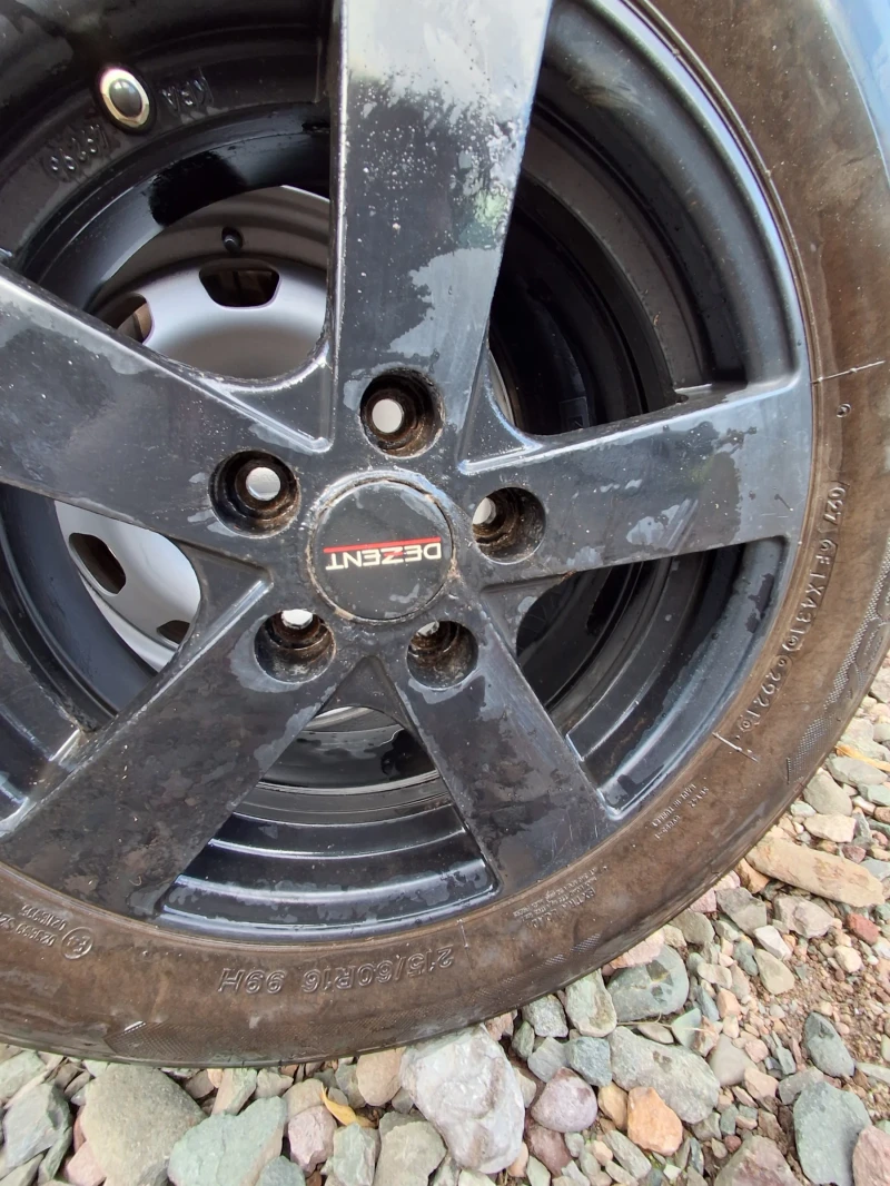 Dacia Duster 1.6 газ 4х4, снимка 16 - Автомобили и джипове - 52590280