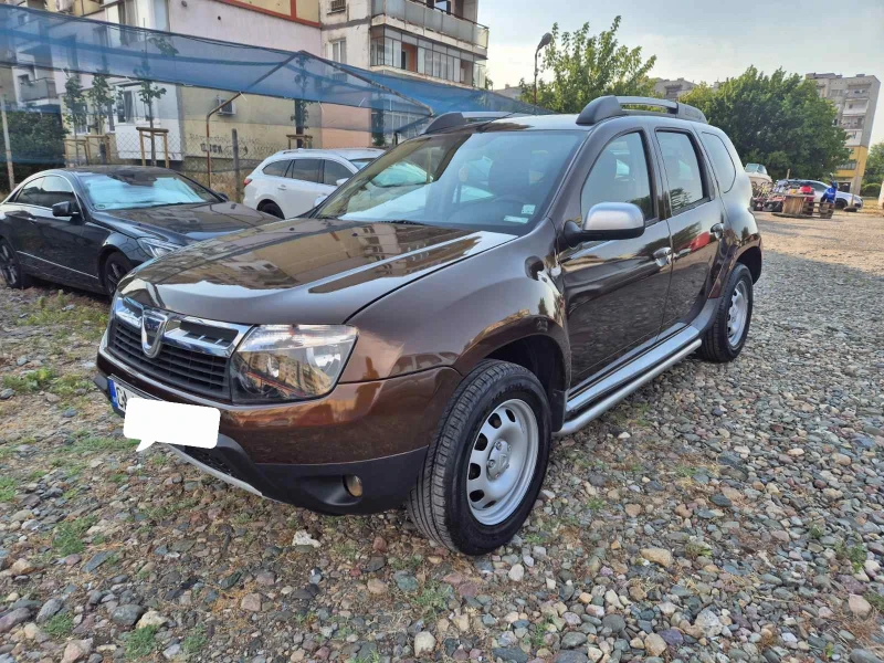 Dacia Duster 1.6 газ 4х4, снимка 9 - Автомобили и джипове - 52590280