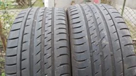      235/40R18