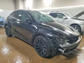 ������ Tesla Model Y