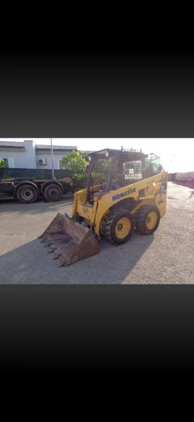 Мини челни товарачи Komatsu 714 - изображение 1