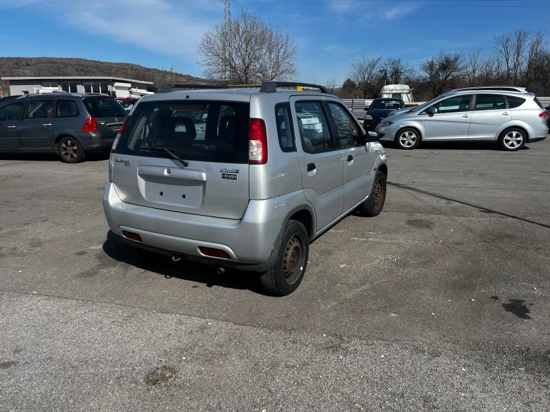 Suzuki Ignis 1.3 i 4x4, снимка 4 - Автомобили и джипове - 48802759