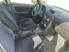 Opel Astra 2. 0 DI 16v, снимка 6