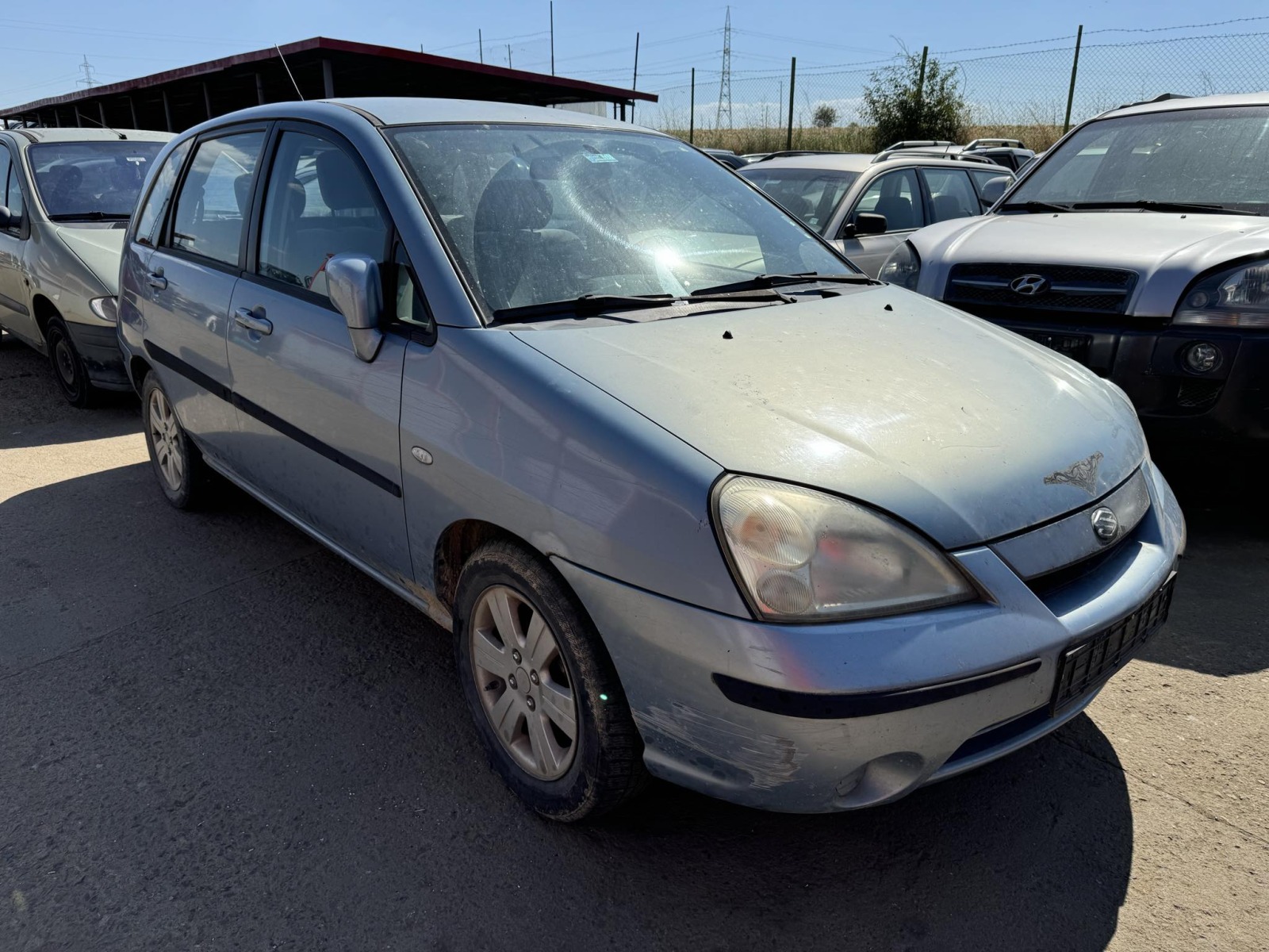 Suzuki Liana 1.6 - изображение 2