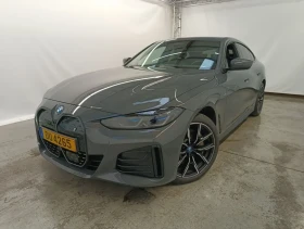 ������ BMW i4