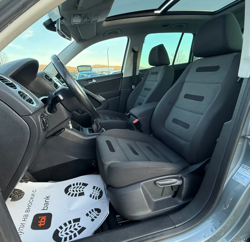 VW Tiguan 2.0TDi 140к.с * Ксенон* * 4-Motion* , снимка 12 - Автомобили и джипове - 53117904