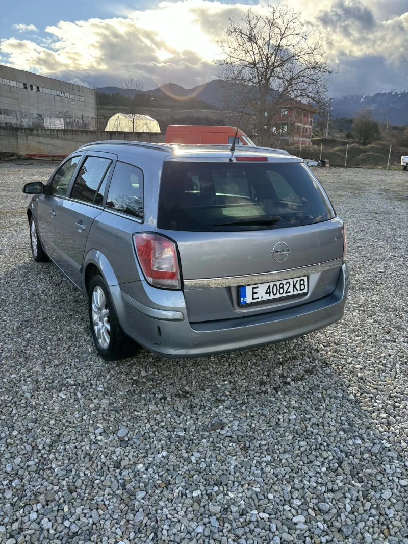 Opel Astra 1.6 Twinport, снимка 5 - Автомобили и джипове - 53488967