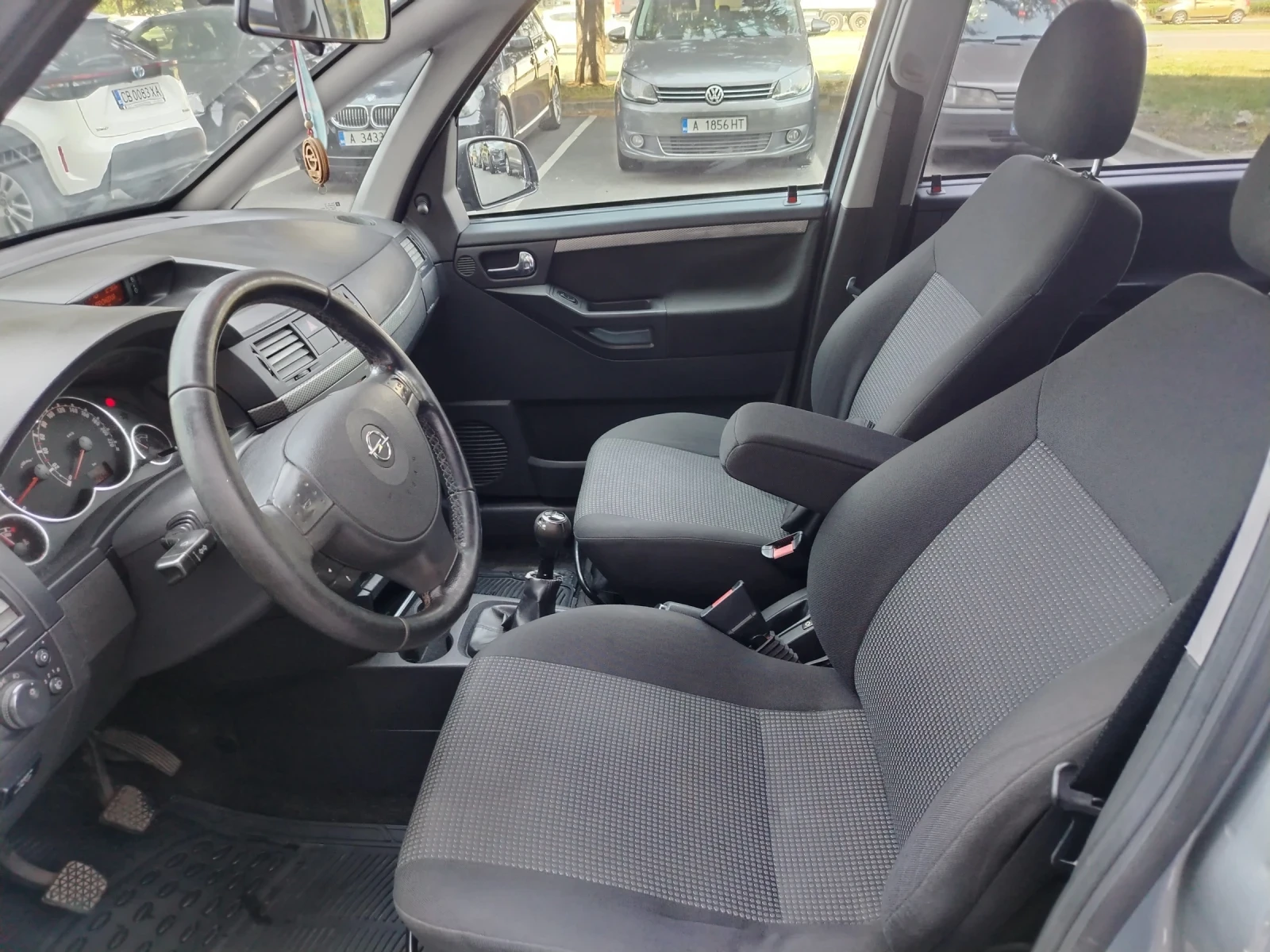 Opel Meriva 1.6 БЕНЗИН-ГАЗ 2010 година , снимка 9 - Автомобили и джипове - 55117521