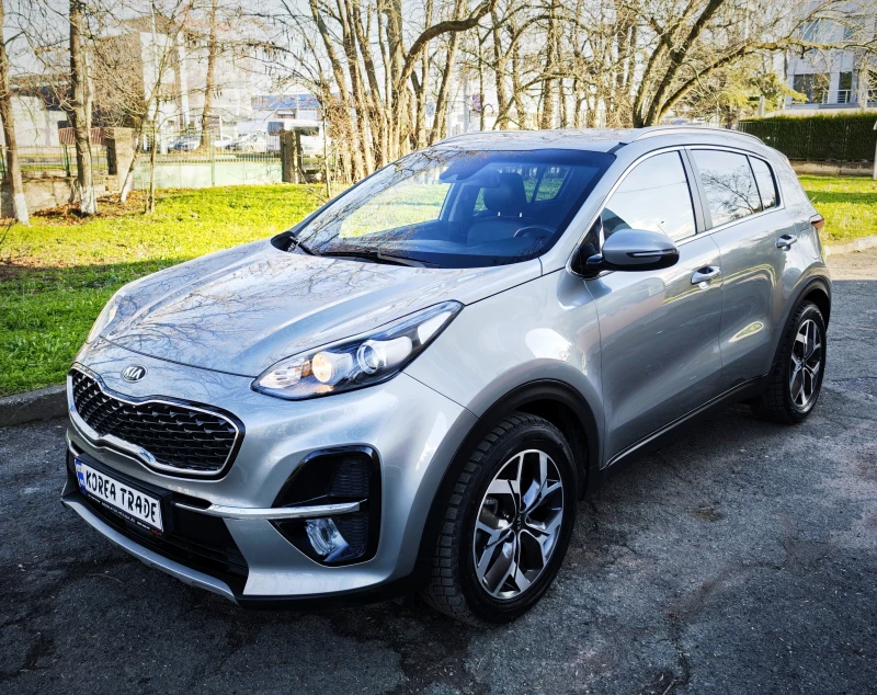 Kia Sportage 2.0 CRDI, снимка 8 - Автомобили и джипове - 53077651