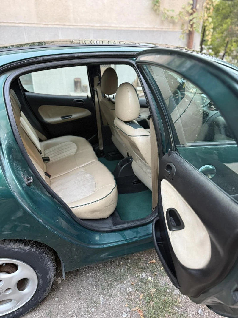Peugeot 206, снимка 15 - Автомобили и джипове - 52103371
