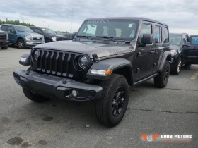 ������ Jeep Wrangler