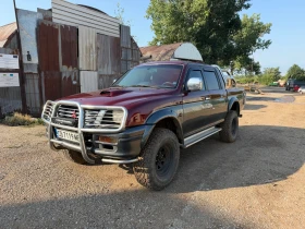 Mitsubishi L200, снимка 1